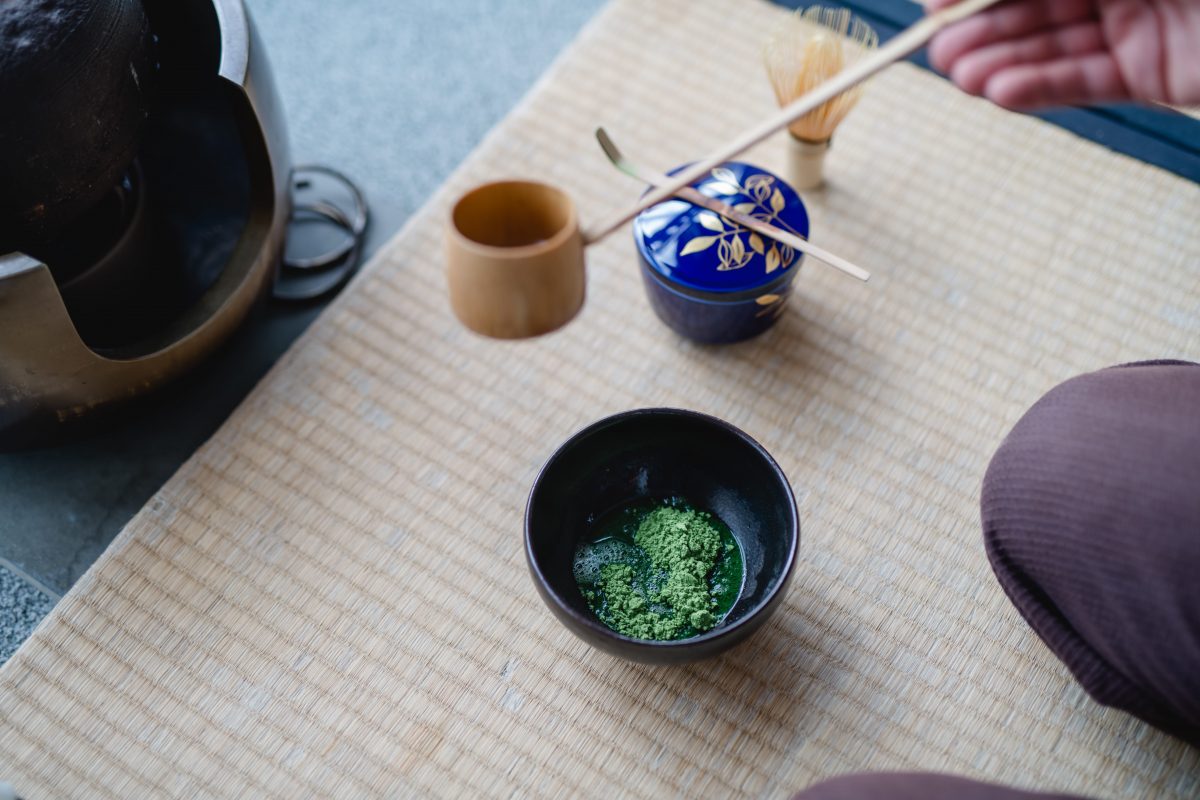 Teaceremony, pouring water on matcha powder in a teabowl